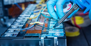 Close up view of electrician providing maintenance services